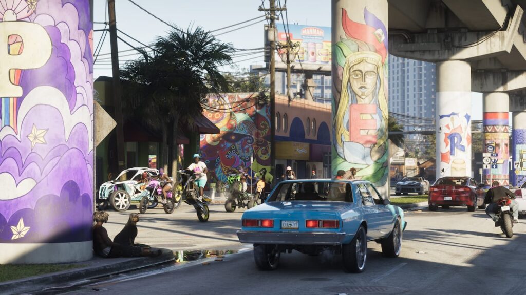 Voiture dans une rue de Vice City aux façades peintes — capture officielle GTA VI